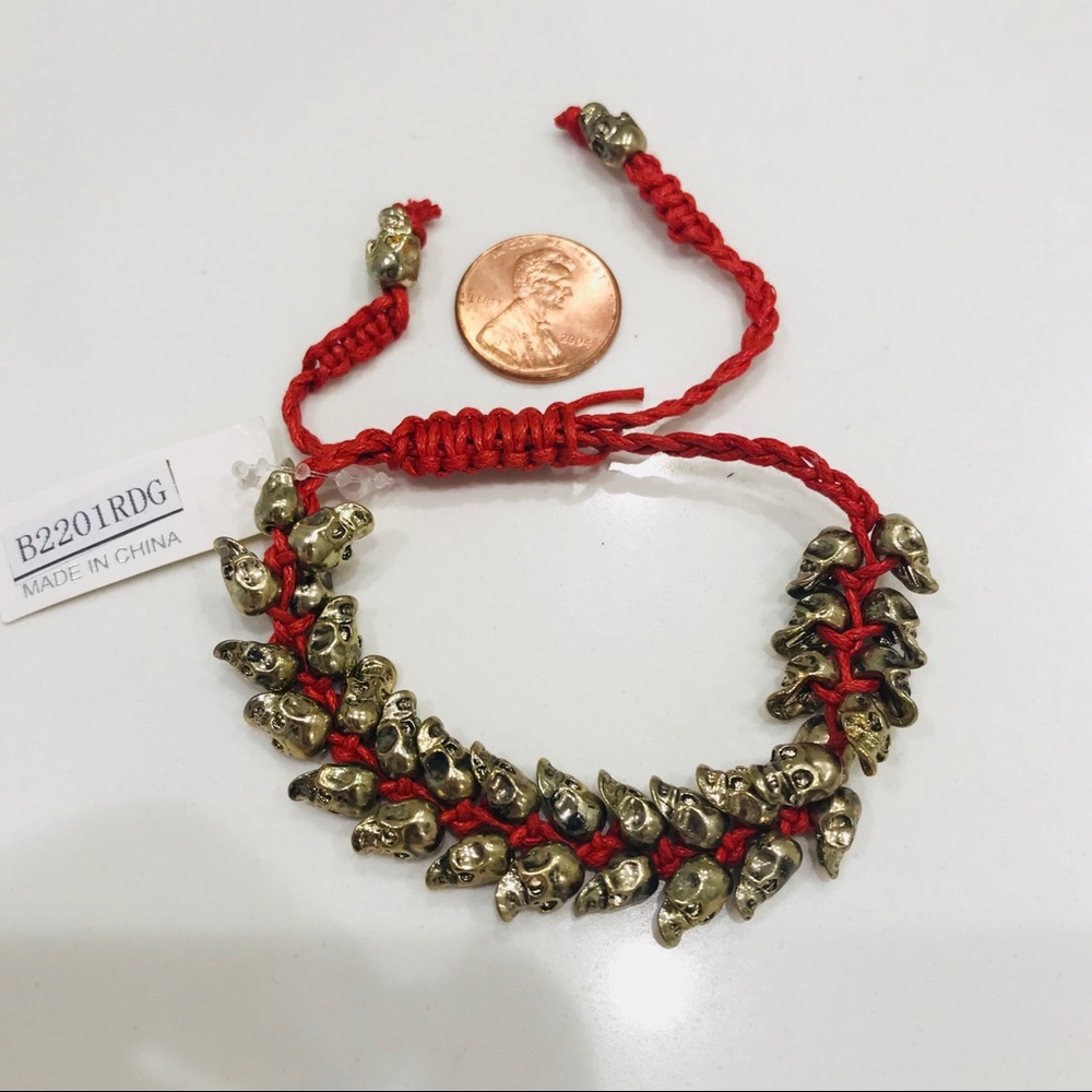 NWT bracelet, multiple bronze skulls & red thread - Picture 7 of 8